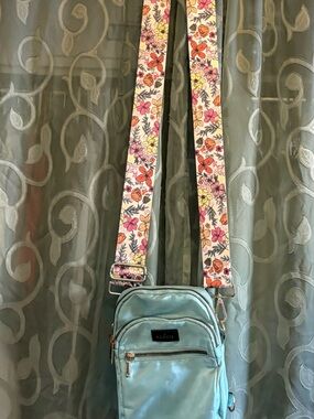 Kenzie crossbody purse/bag with adjustable, detachable floral strap.